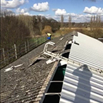 Removal of asbestos cement roofing and replacement with Kingspan KS1000RW insulated roof 